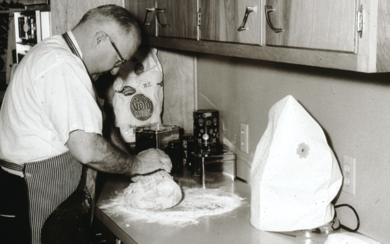 Kneading dough in the kitchen at Vincennes University