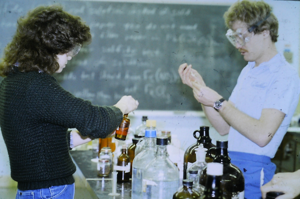 Chemistry lab students perform a reagent experiment