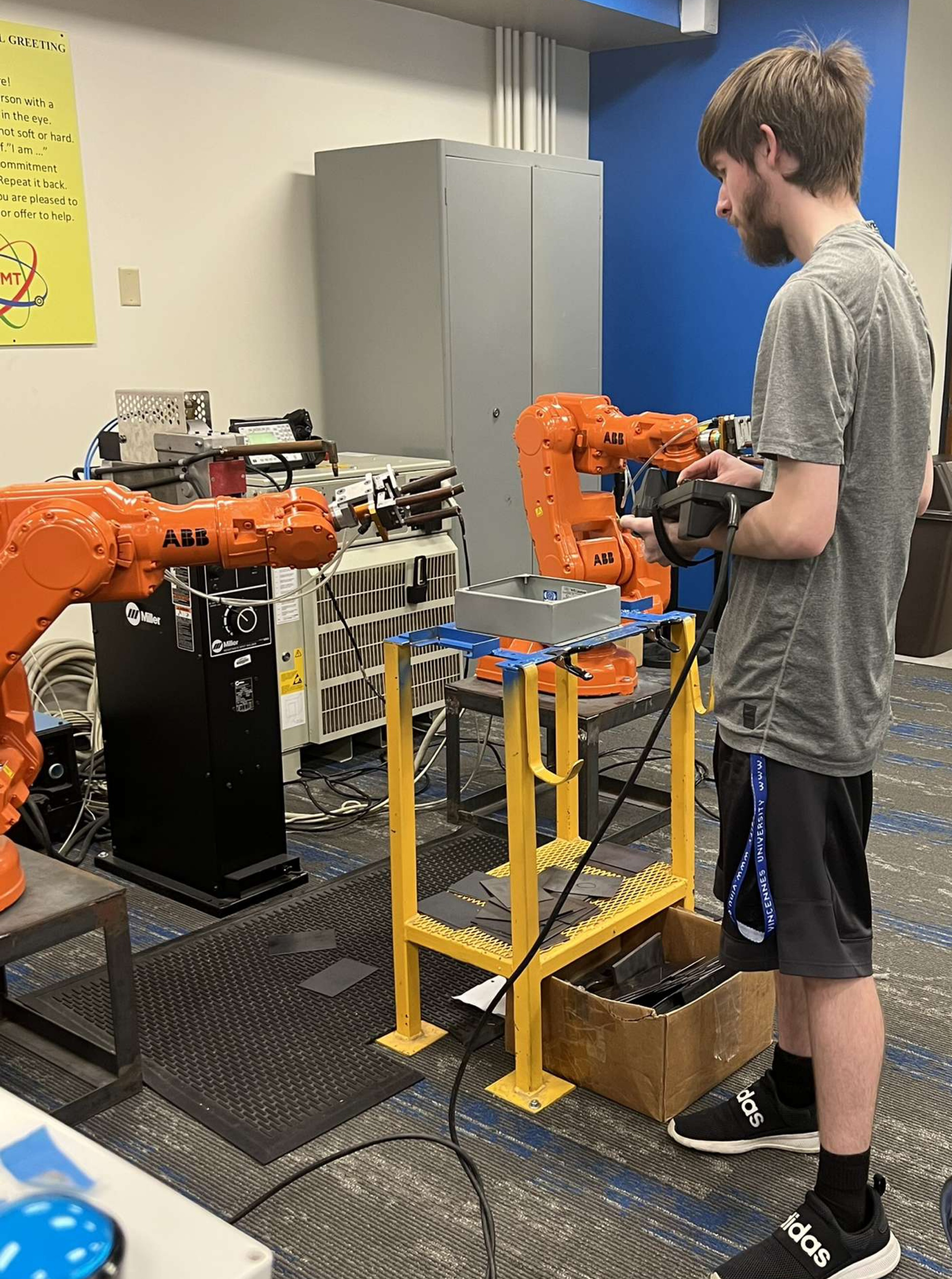 VU student Brock Wilson operates a robot in Technology Center on Vincennes Campus