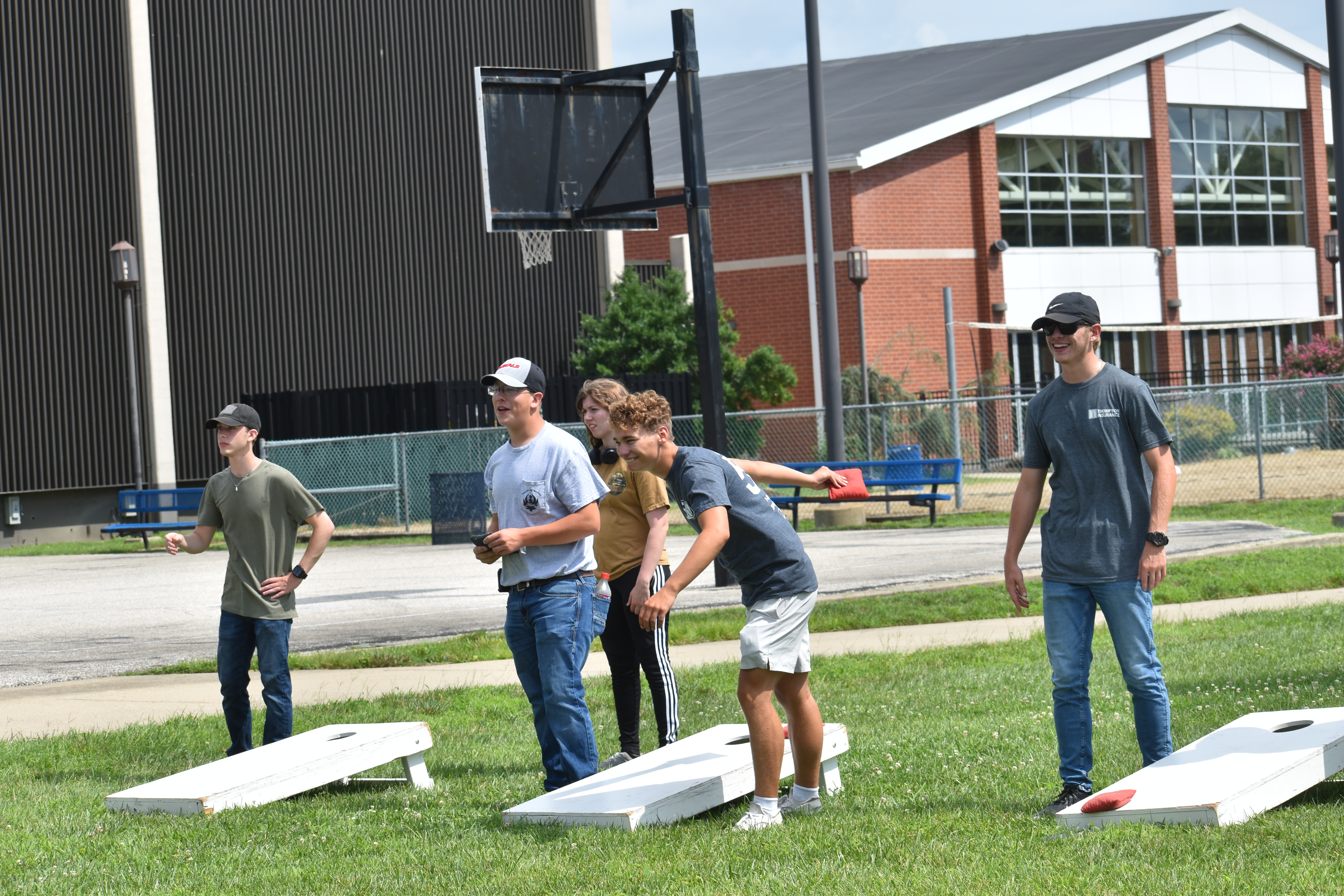 Male students playing cornhole at the VU intramural fields.